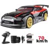 Contenu de la boîte de la GT3 RC drift : radiocommande, pneus, câble et batteries, 70 km/h